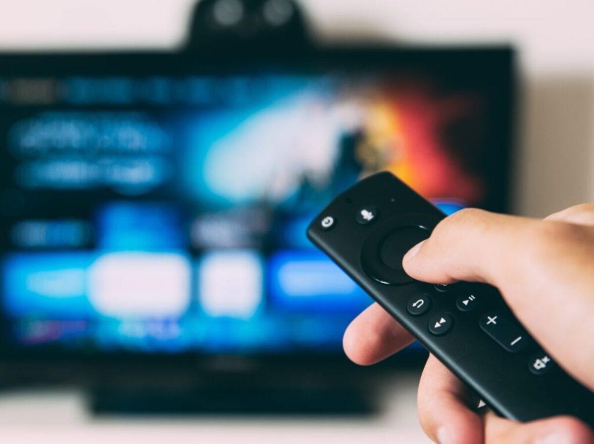 turned-on flat screen television