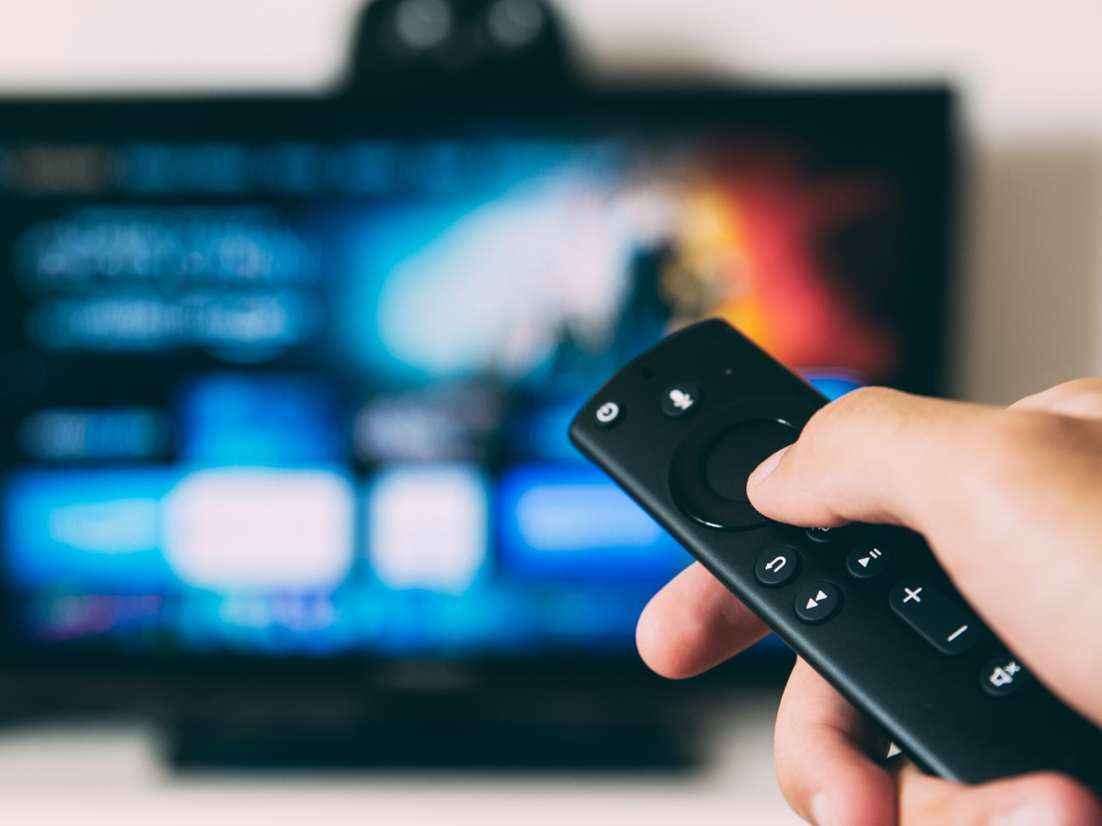 turned-on flat screen television