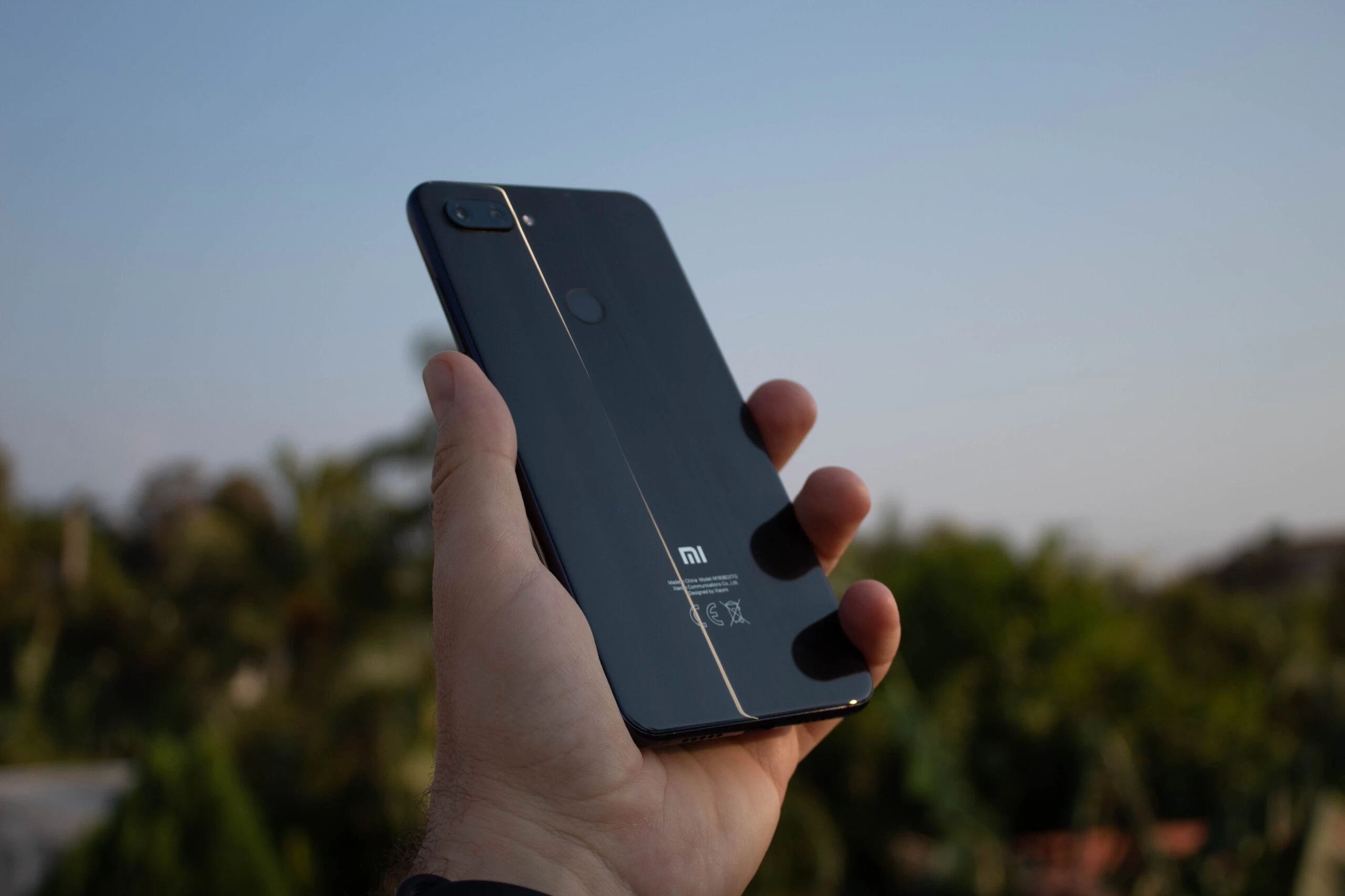 person holding black iphone 5