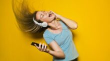 woman wearing white headphones