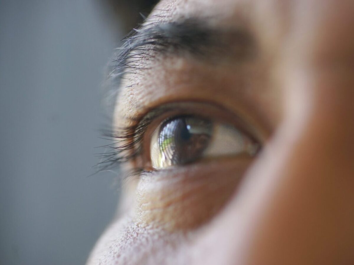 persons eye in close up photography