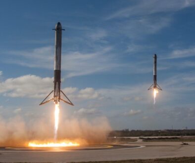 twom white flying rockets during daytime