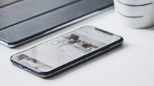 black smartphone beside black smart case