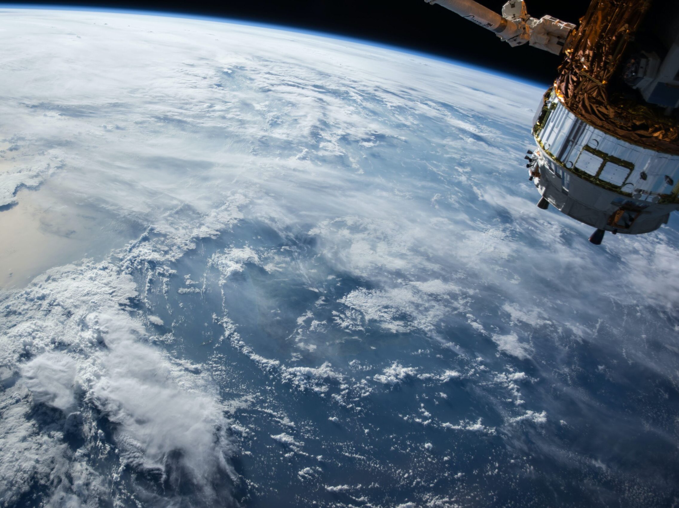 view of Earth and satellite