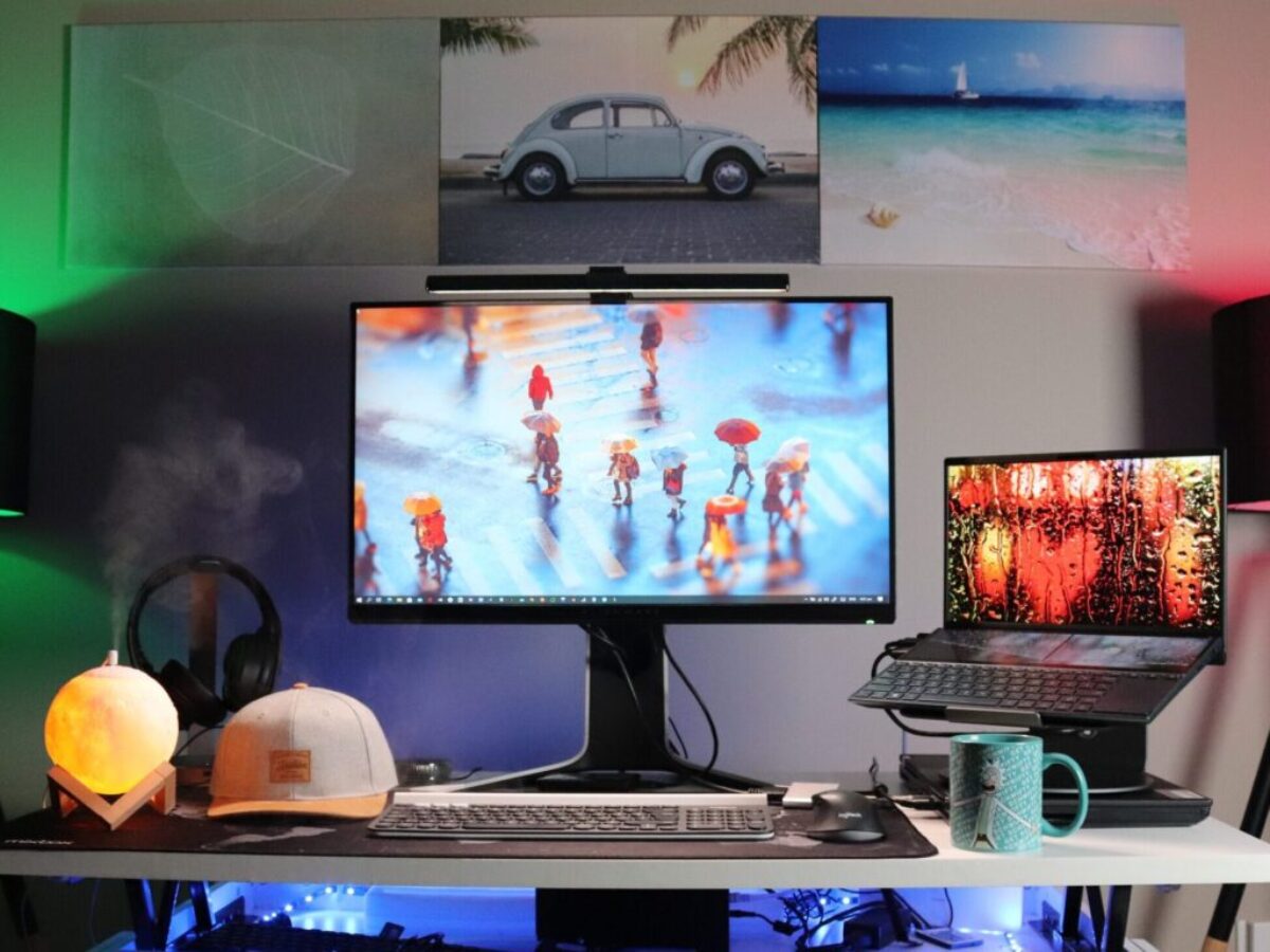 black flat screen computer monitor on white desk
