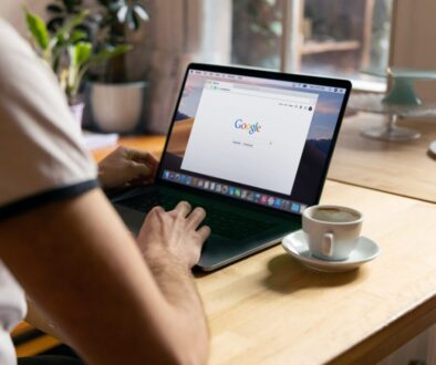 person using black laptop computer