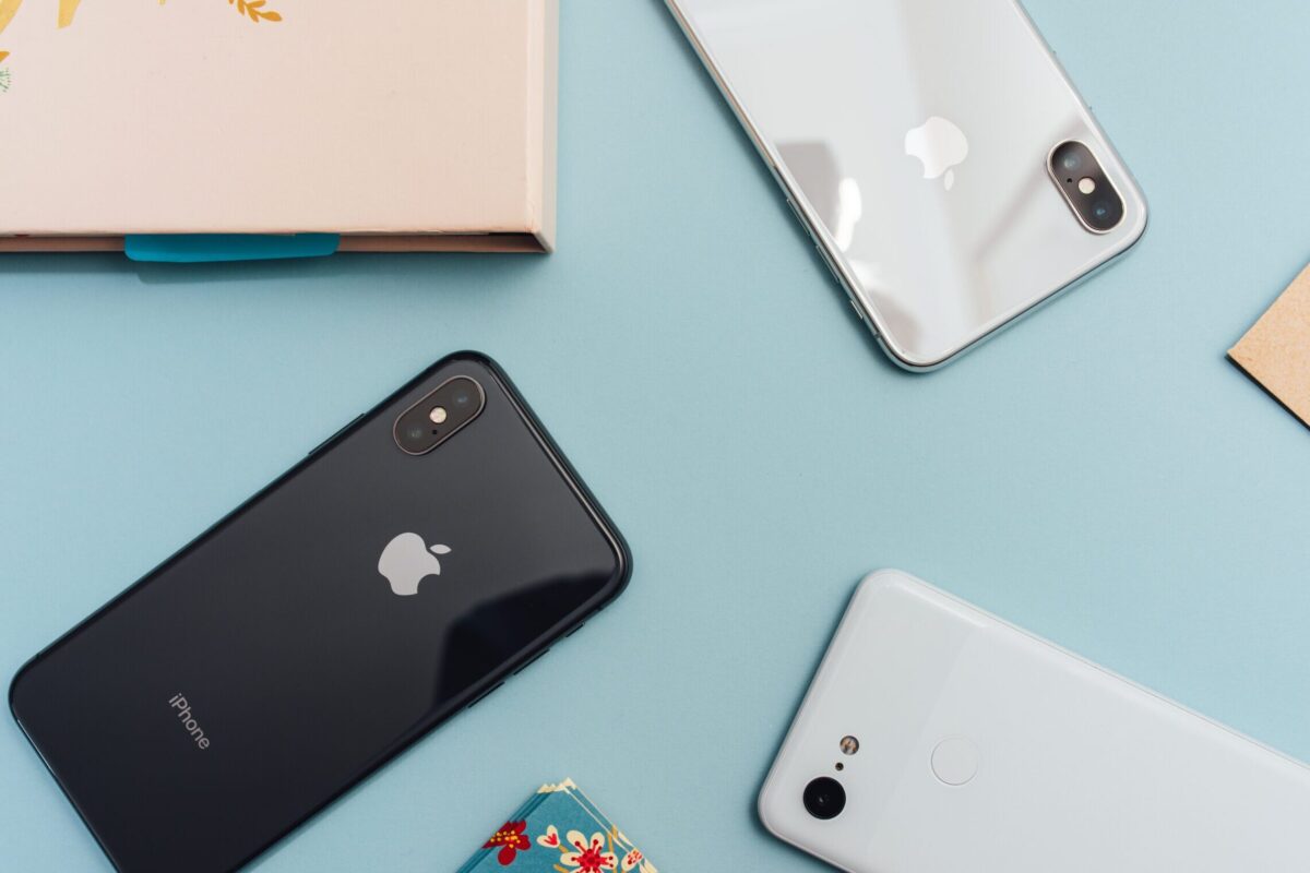 space gray iPhone X on blue surface