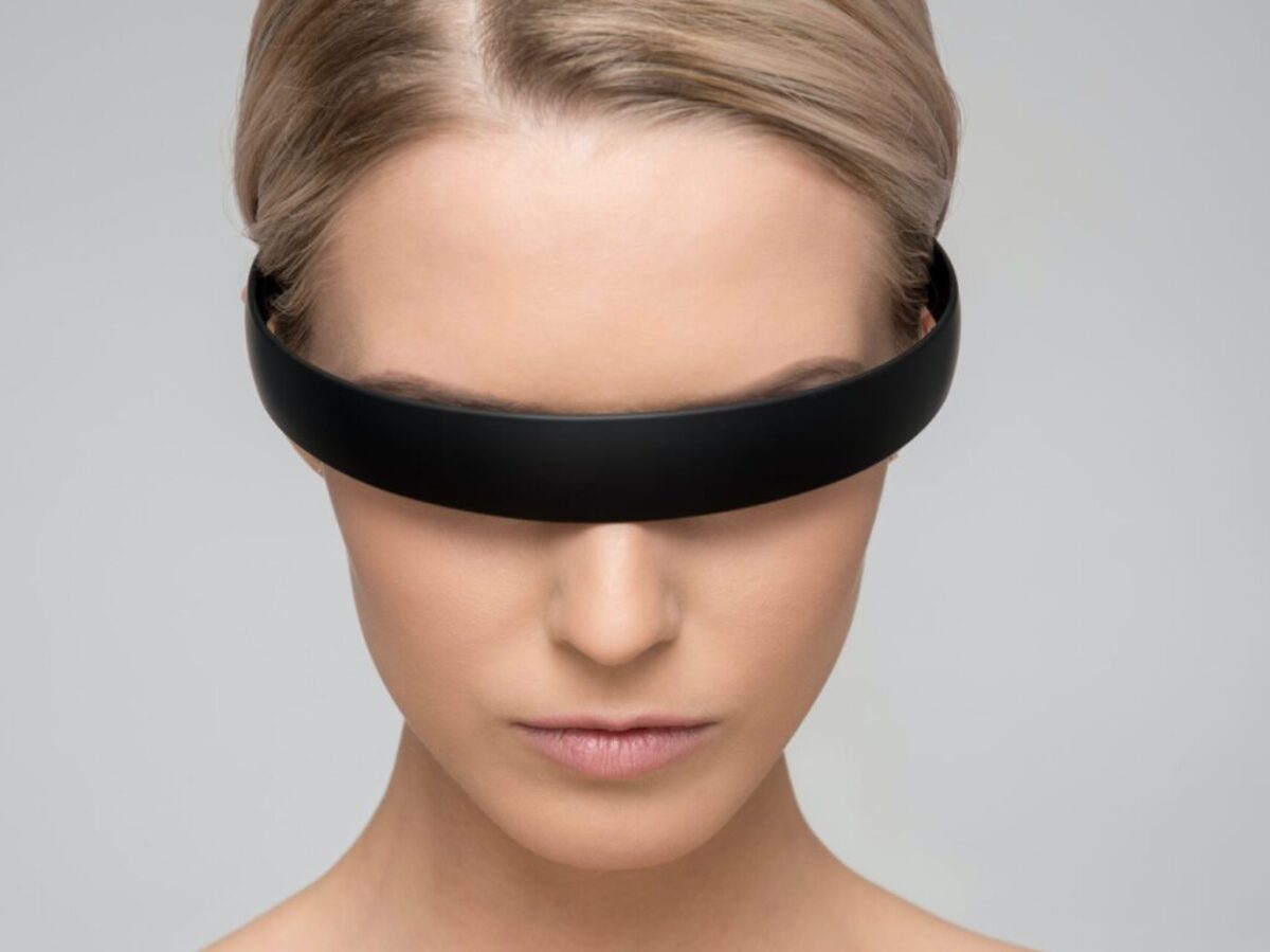 woman wearing black Alice band