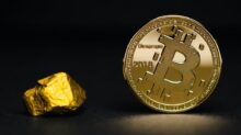 round gold-colored bit coin