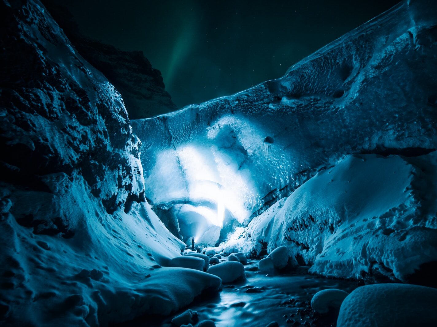 person on white cave