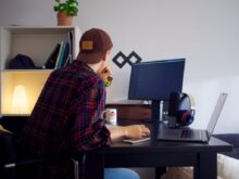 man in front of desktop
