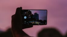 person holding black android smartphone