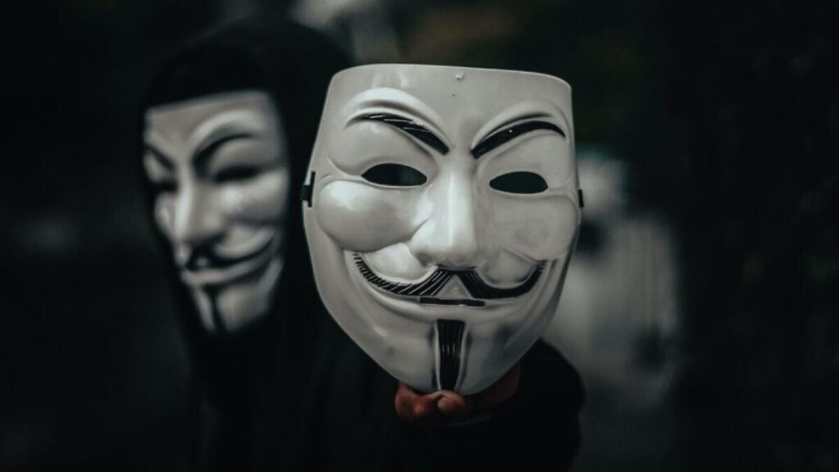 person in black and white mask