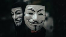 person in black and white mask