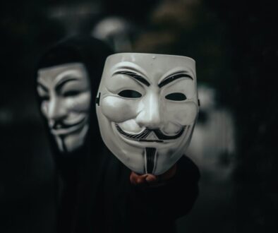 person in black and white mask