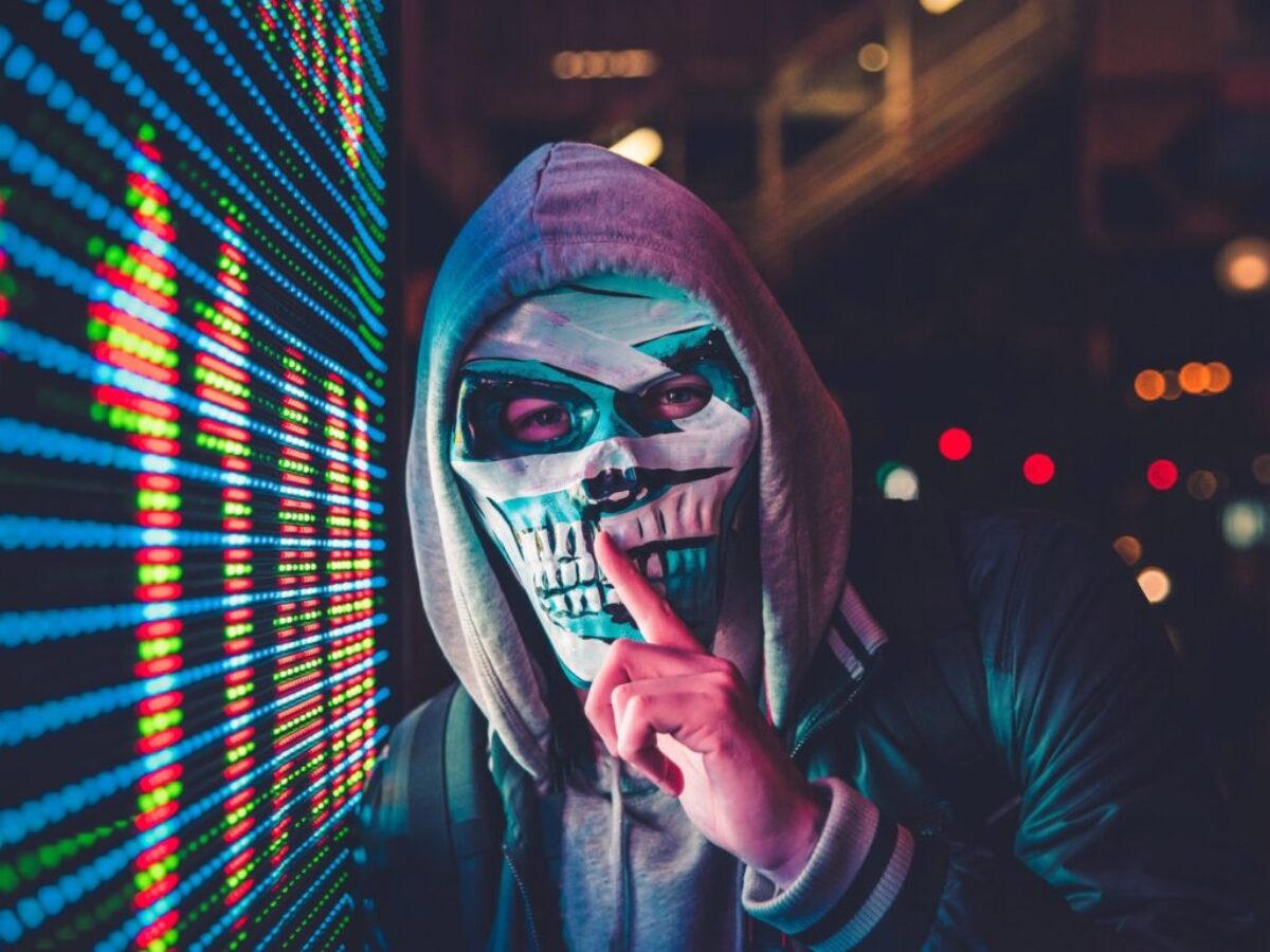 person standing near LED sign