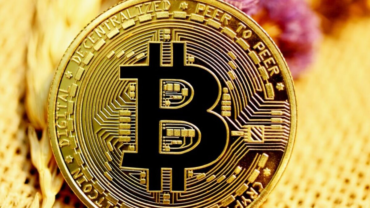 gold and black round coin