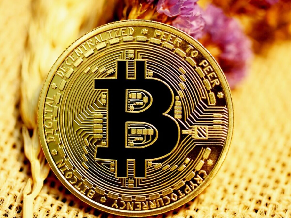 gold and black round coin