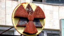 red and yellow radioactive signage at the building