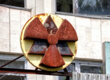 red and yellow radioactive signage at the building
