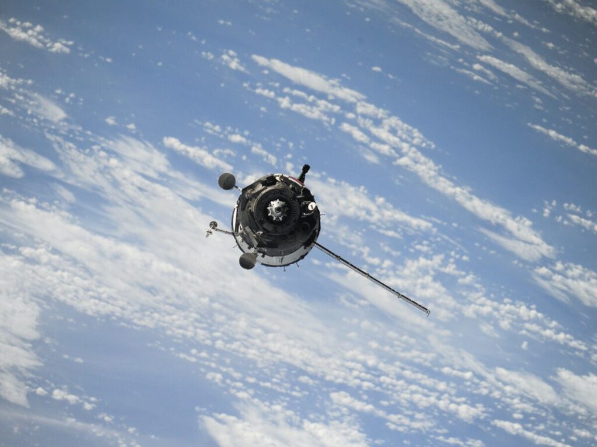 satellite flying on space