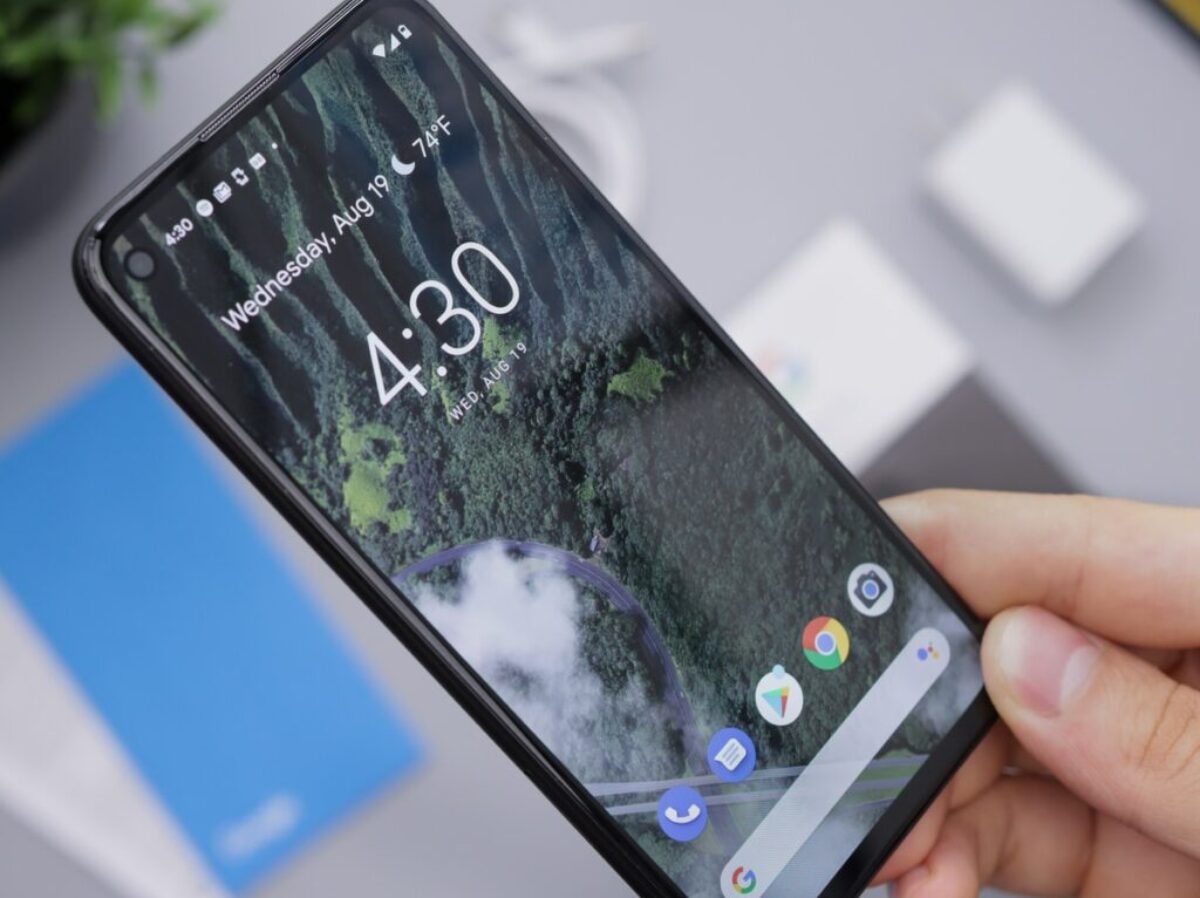 person holding black android smartphone