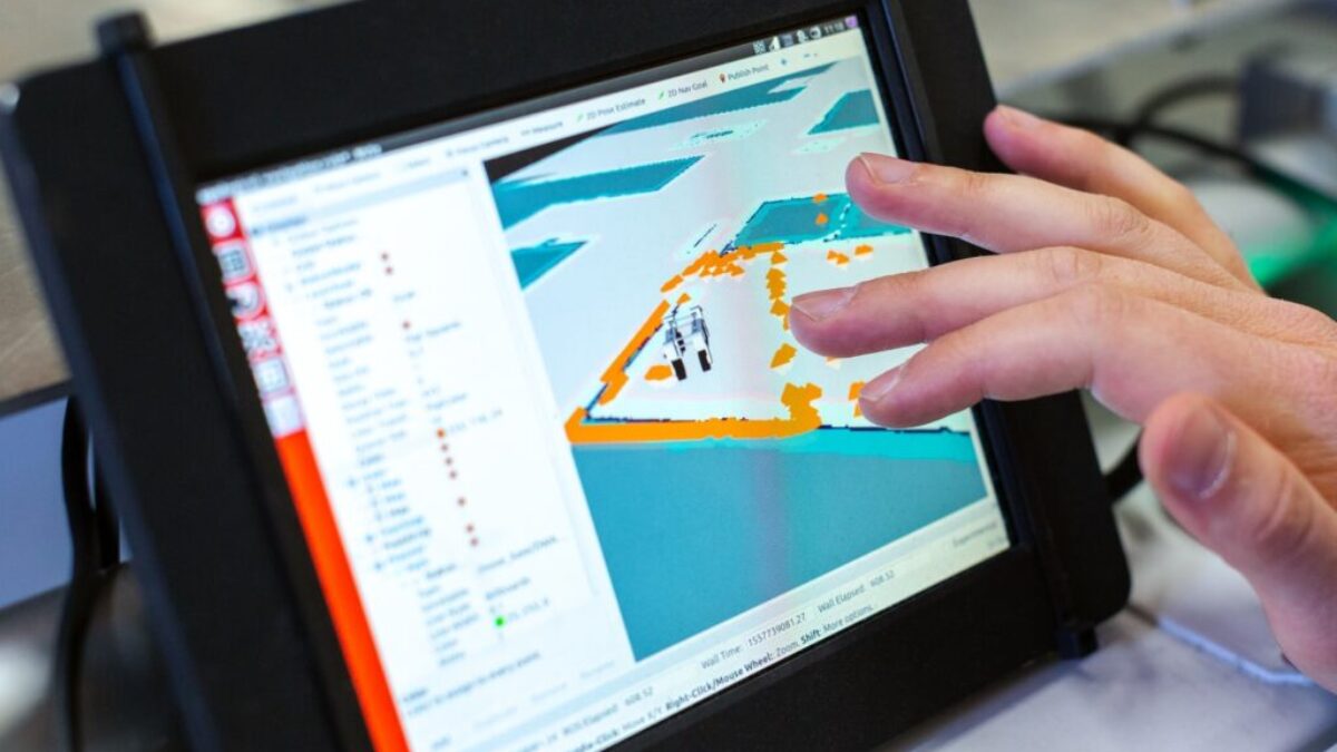 person holding black tablet computer