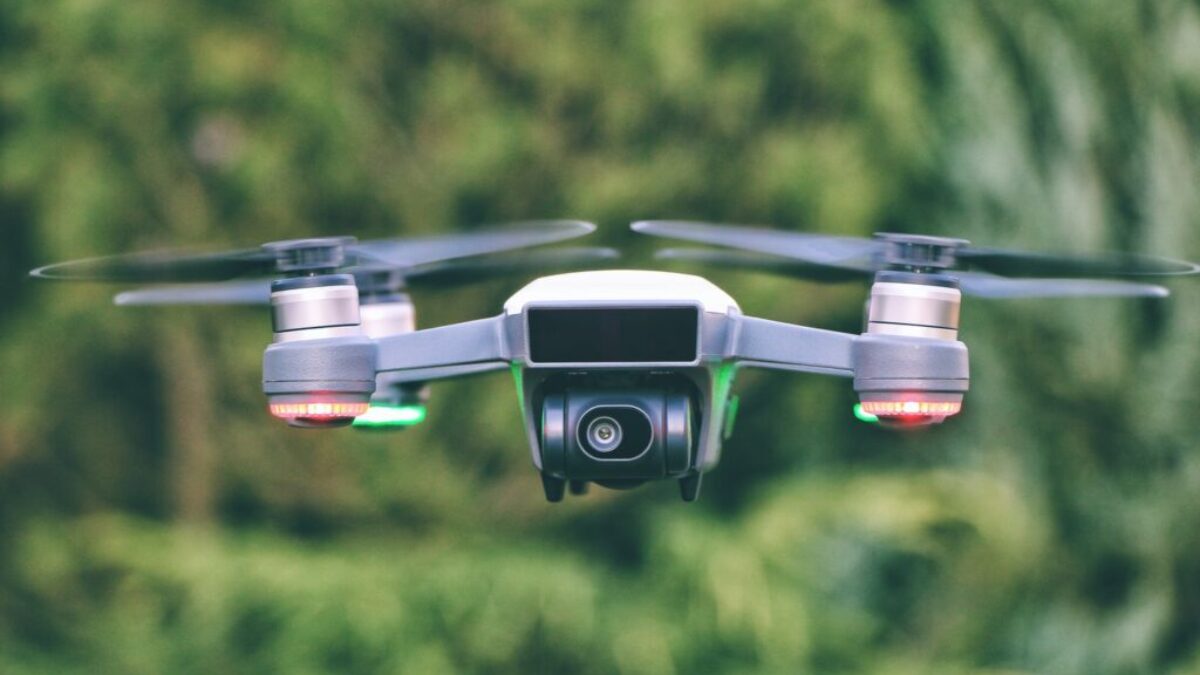 selective focus photography of gray drone