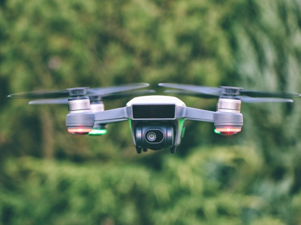 selective focus photography of gray drone