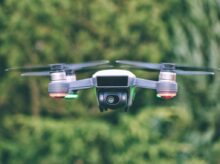 selective focus photography of gray drone