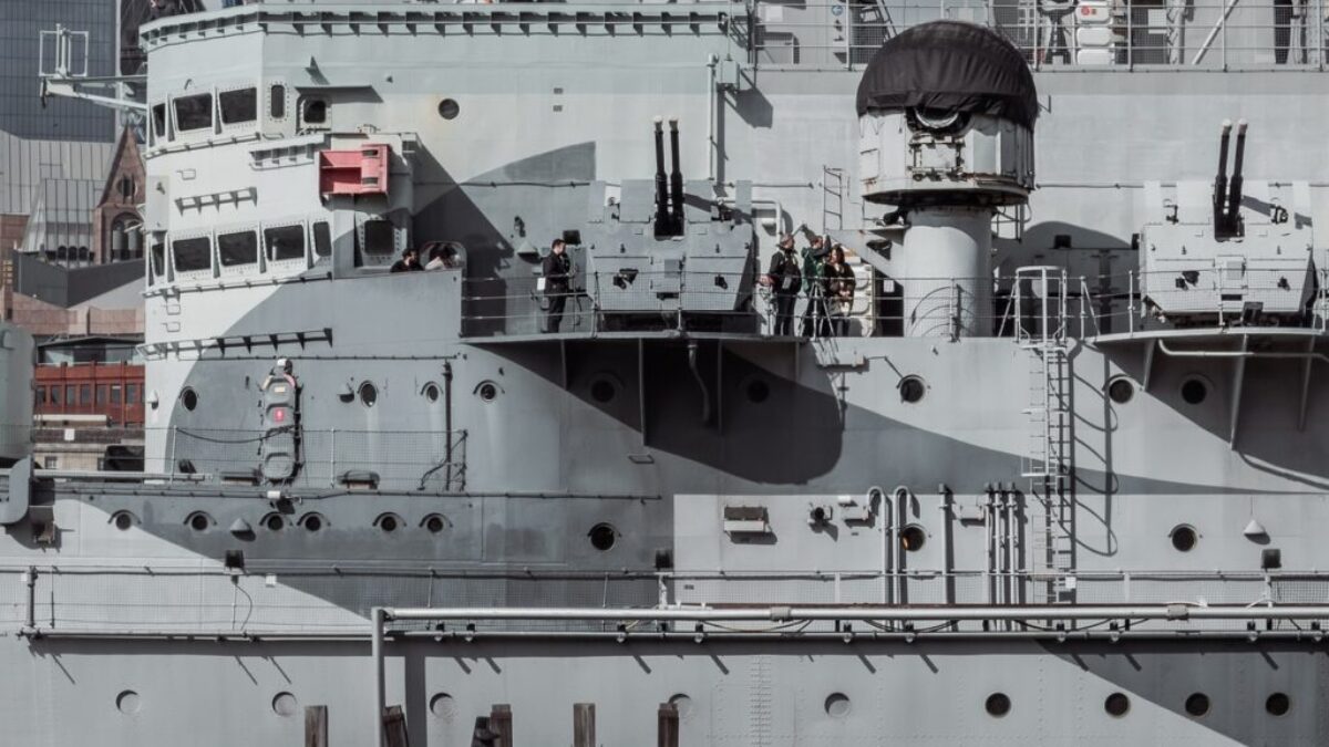 grey battleship in dock