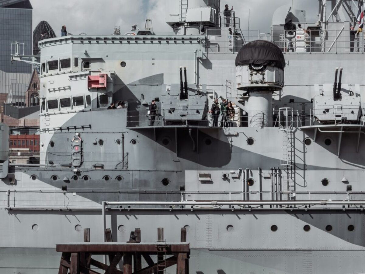 grey battleship in dock