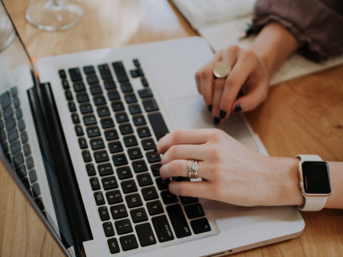 person using MacBook