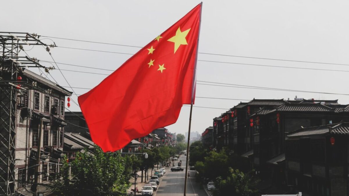 red and white flag on pole