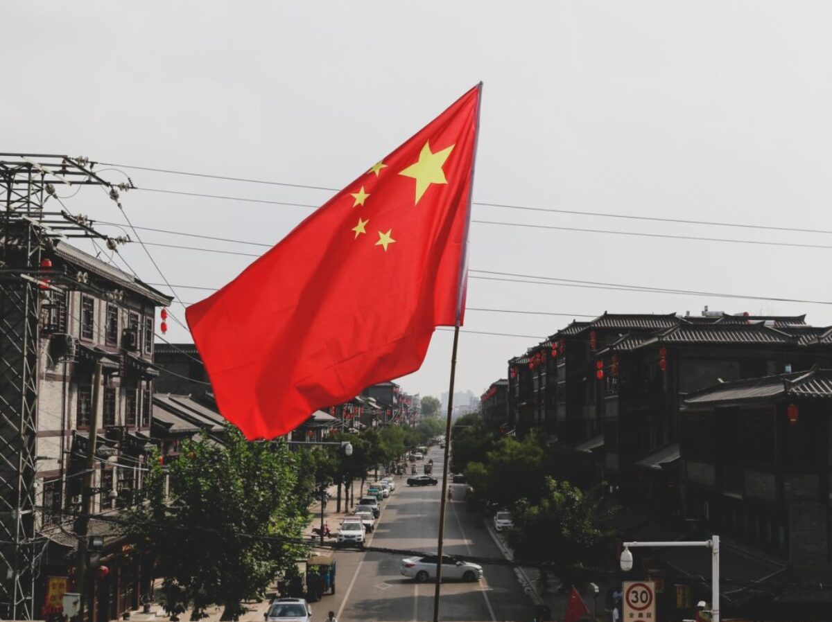 red and white flag on pole