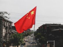 red and white flag on pole