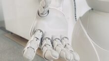 closeup photo of white robot arm