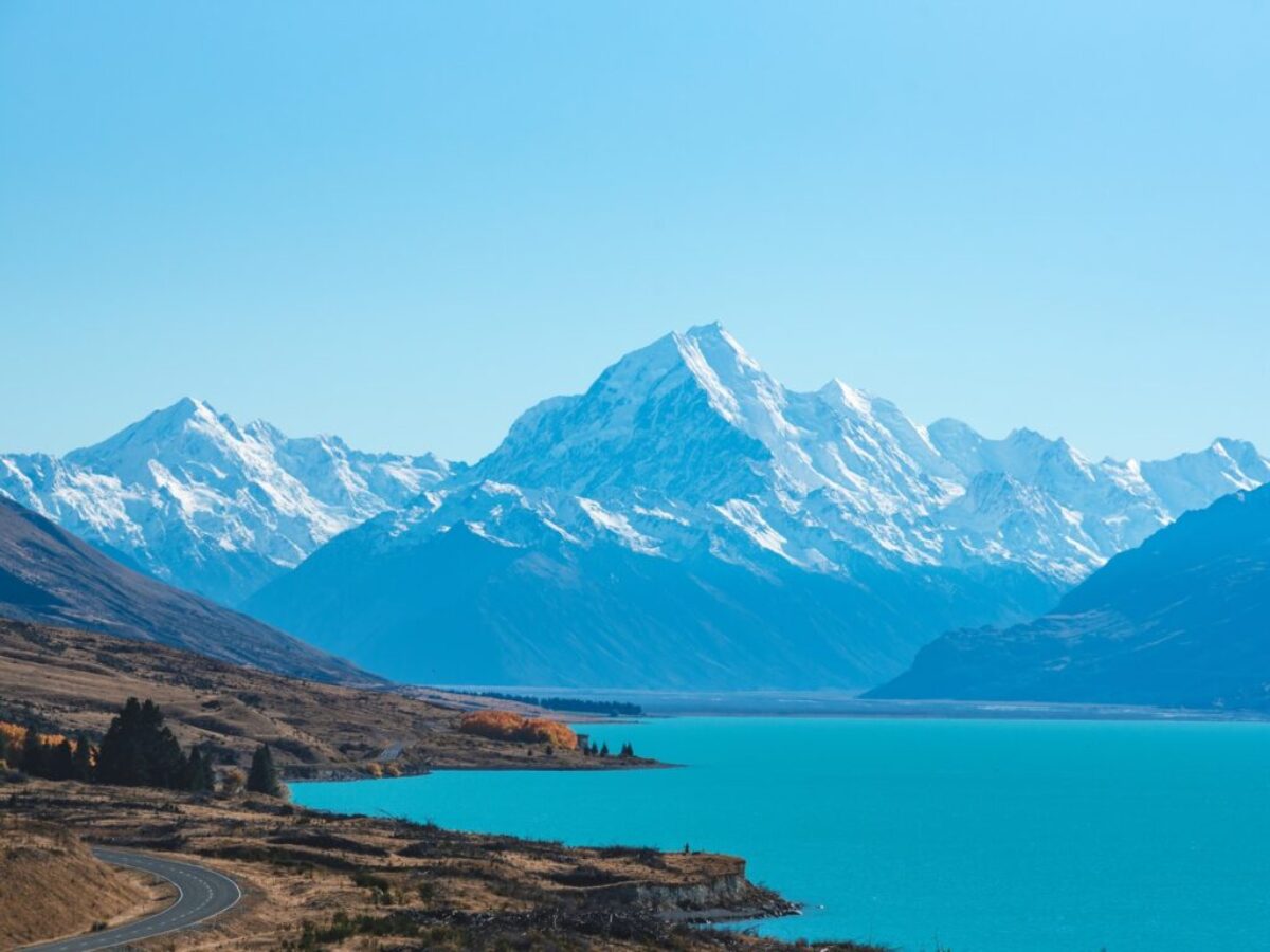 body of water surrounded by mountains