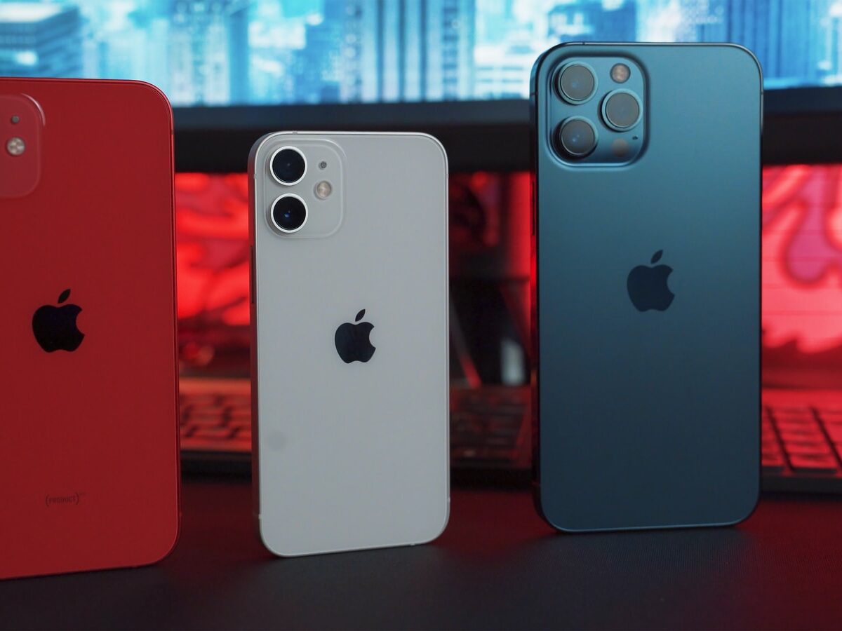 silver iphone 6 and red iphone case