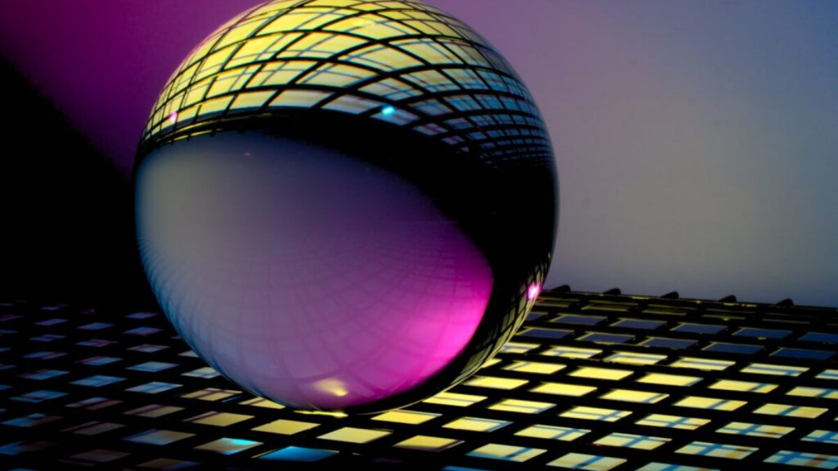 blue and black ball on blue and white checkered textile