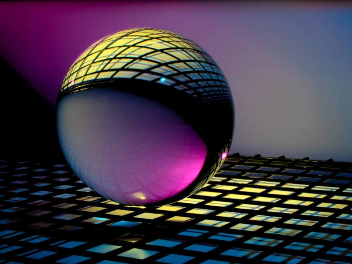 blue and black ball on blue and white checkered textile