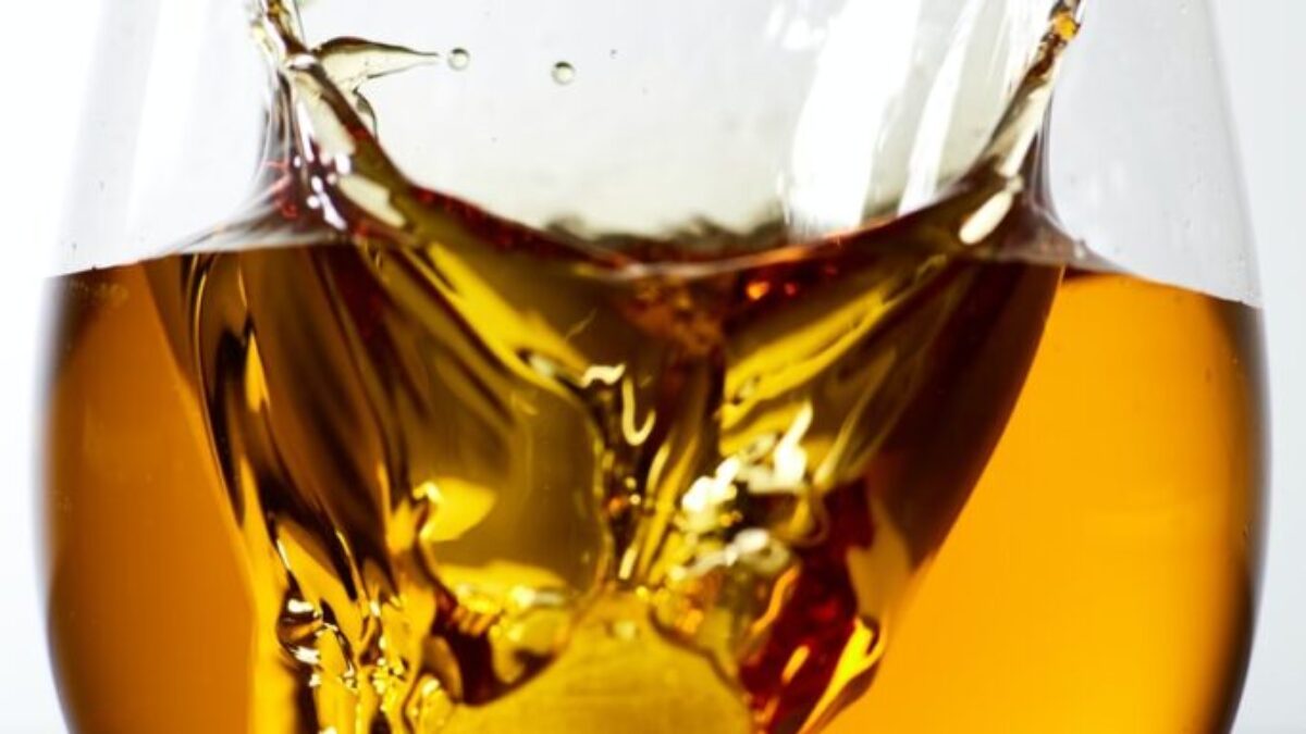 liquor filled clear stemless glass
