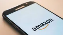 black Samsung Galaxy smartphone displaying Amazon logo