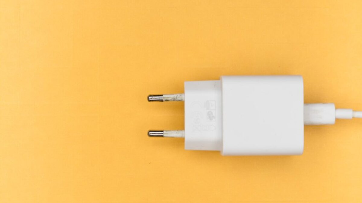 white adapter on yellow surface
