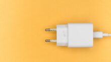 white adapter on yellow surface