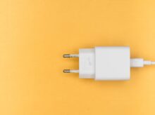 white adapter on yellow surface