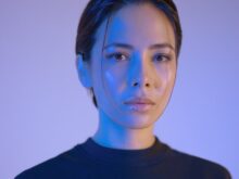 woman wearing black crew-neck shirt
