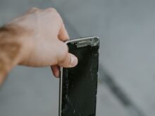person holding black samsung android smartphone