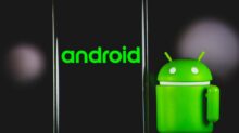 green frog iphone case beside black samsung android smartphone