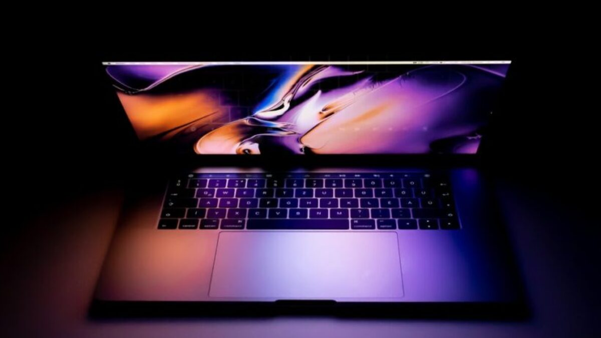 turned on laptop on table